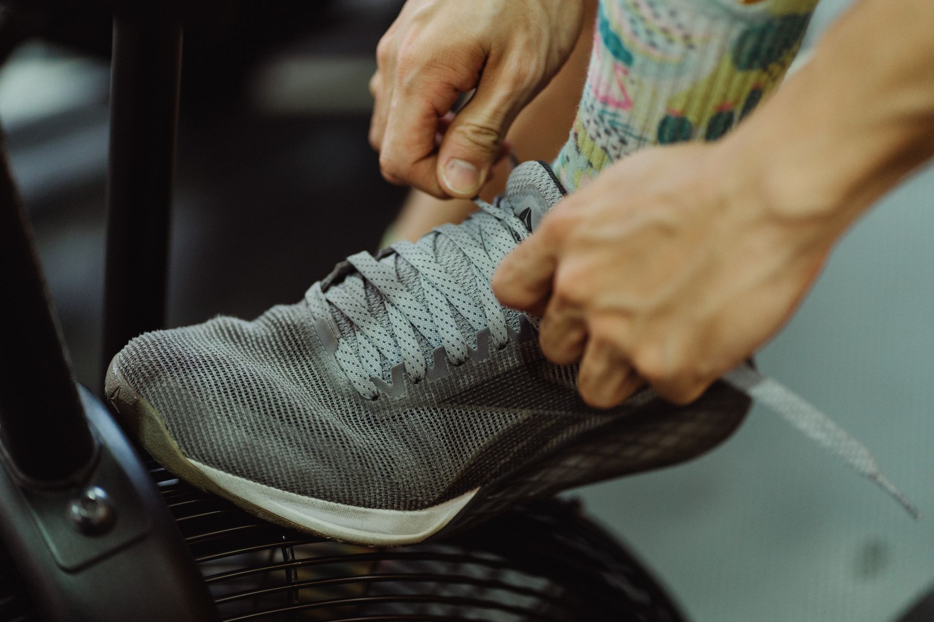 Close-up detail of bold, multi-colored athletic sneaker upper and sole