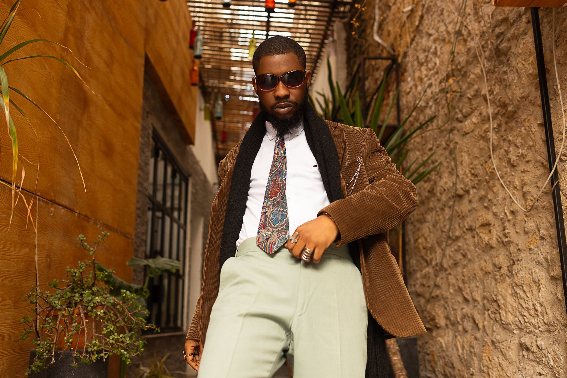 Man wearing smart casual clothing and leather shoes in an urban setting