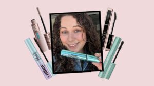 Close-up of waterproof mascara wand with black formula against a clean background