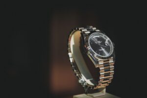 GIA and FHH Bring Watchmaking Education to Global Classrooms by 2027 Luxury timepieces displayed in a watch retail setting