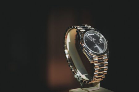 GIA and FHH Bring Watchmaking Education to Global Classrooms by 2027 Luxury timepieces displayed in a watch retail setting