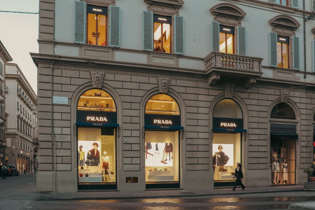 Capri Holdings Draws Acquisition Interest as Financial Obstacles Loom Interior of a high-end luxury fashion boutique with designer displays