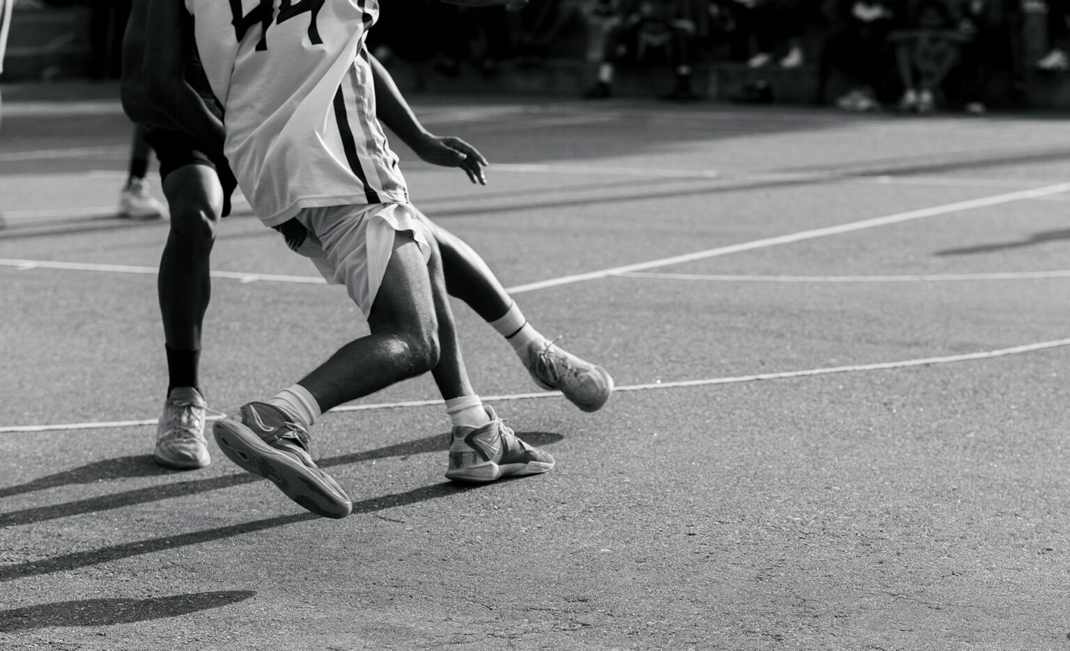 Close-up of basketball sneakers on an indoor court