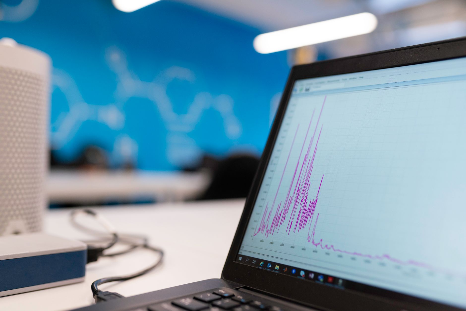Person reviewing customer data analytics on a laptop screen