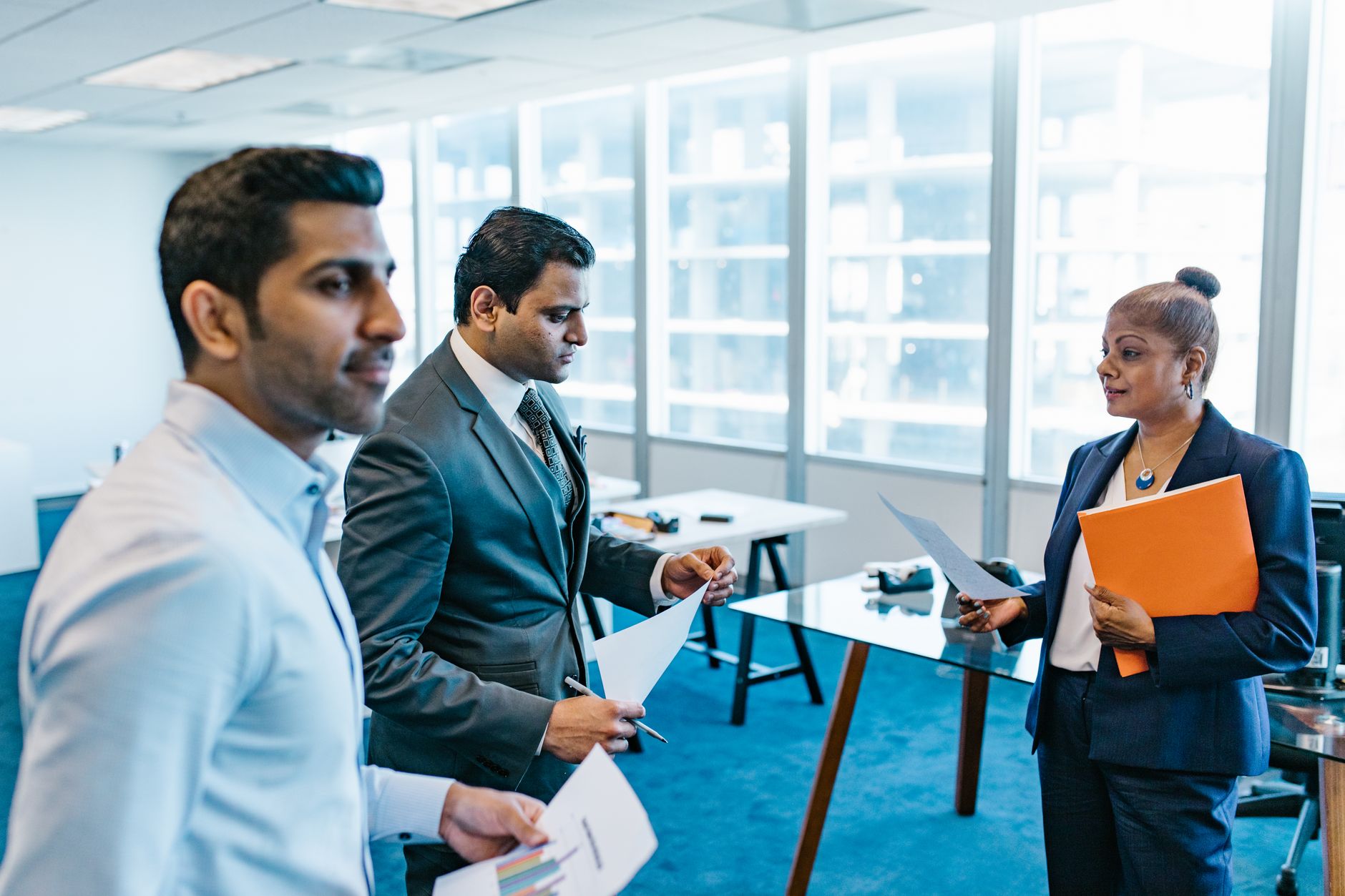 Business professionals in a corporate meeting discussing strategy
