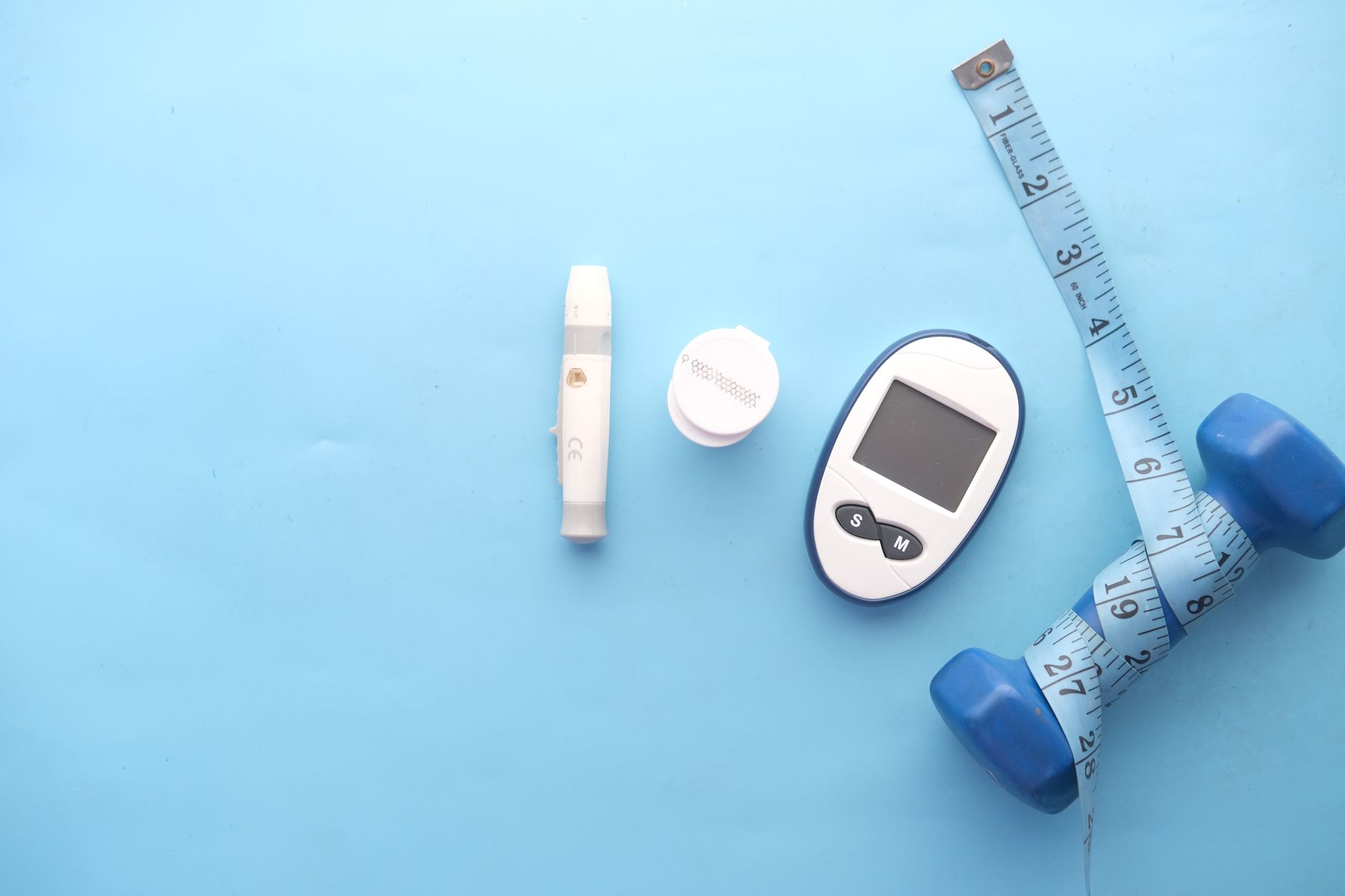 Close-up of a medical professional discussing weight loss treatment options with a patient