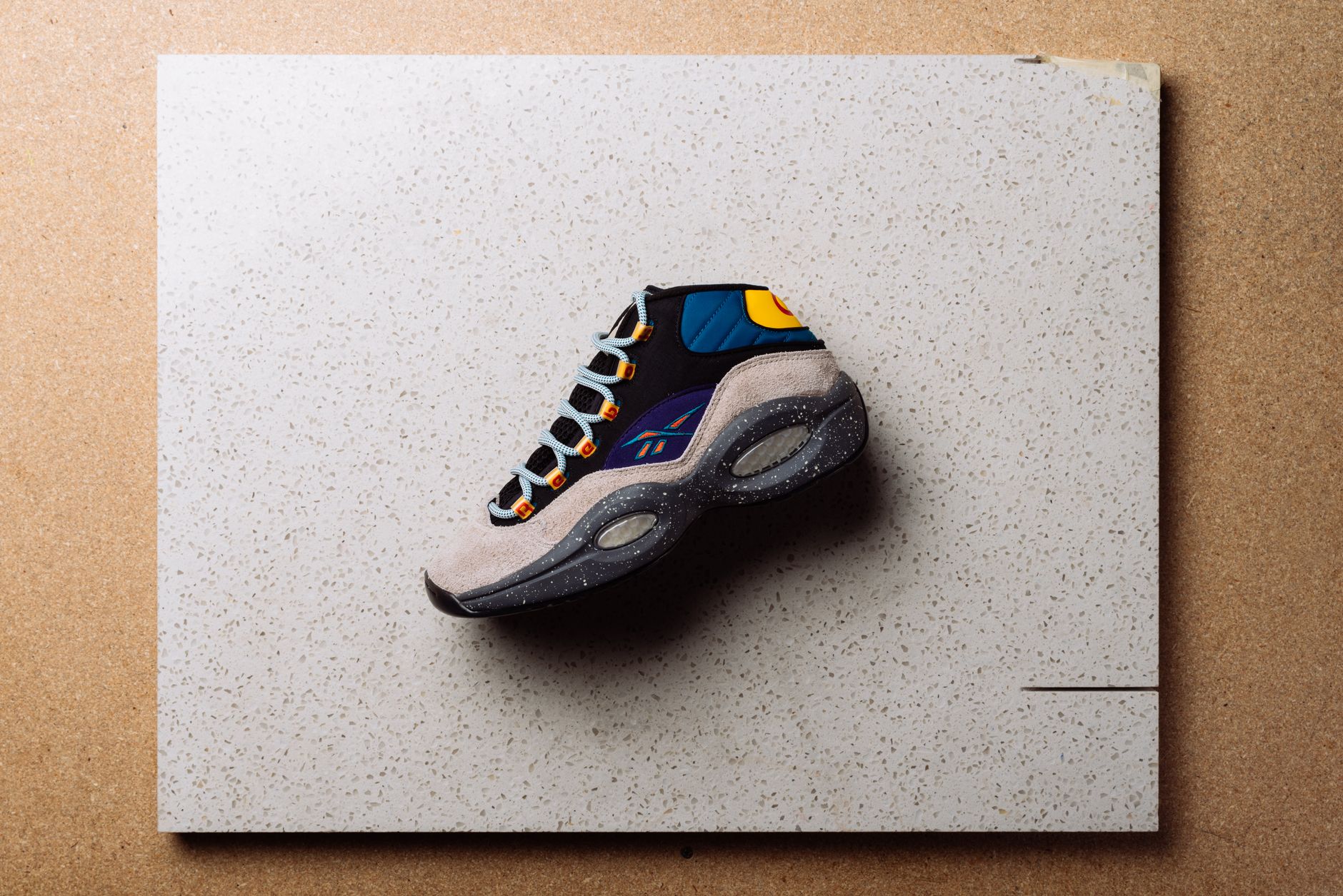 Exclusive limited edition sneaker displayed on minimalist background