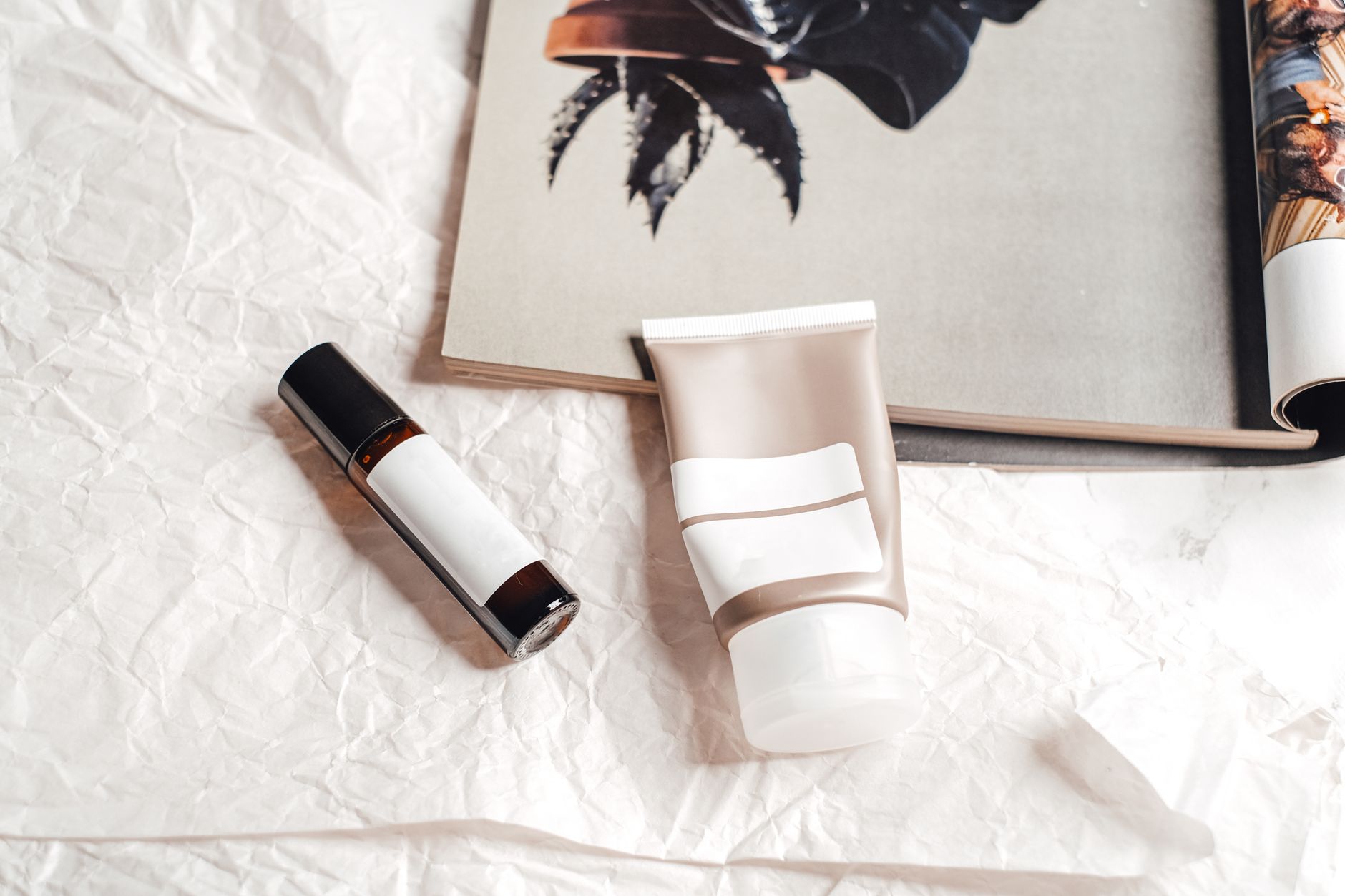 Premium personal care and beauty products displayed on a marble surface