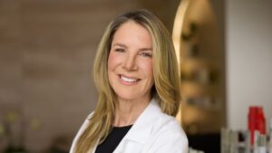 GLP-1 Drugs Are Rewriting What Plastic Surgeons Do All Day A plastic surgeon consulting with a patient in a modern medical office