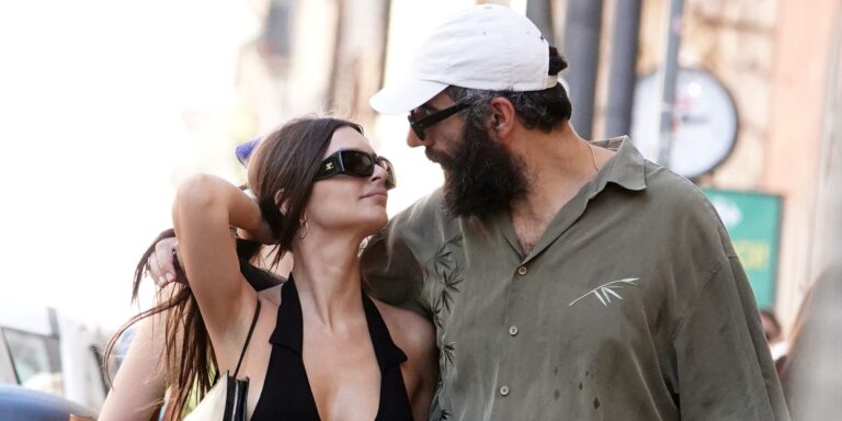 Emily Ratajkowski Dating French Director Romain Gavras A film director reviewing footage on set with crew in background