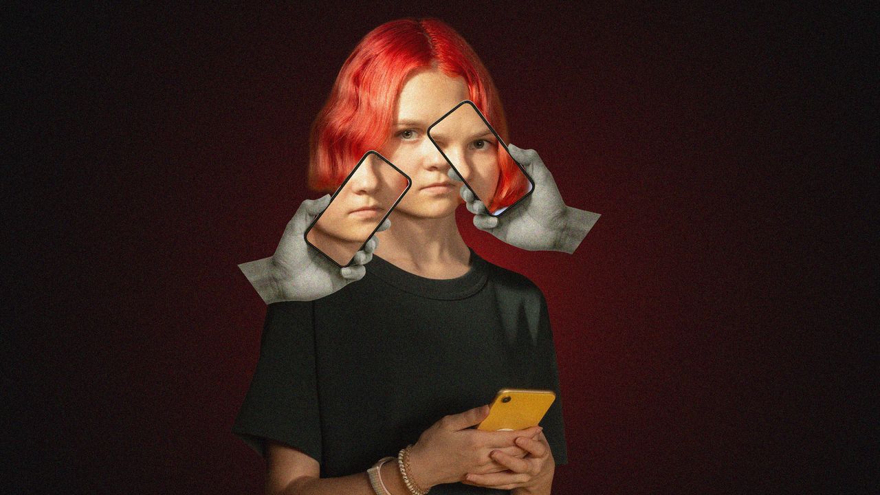 A teenager taking a selfie on a smartphone with a social media app open
