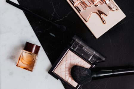High-end beauty and skincare products arranged on a sleek surface