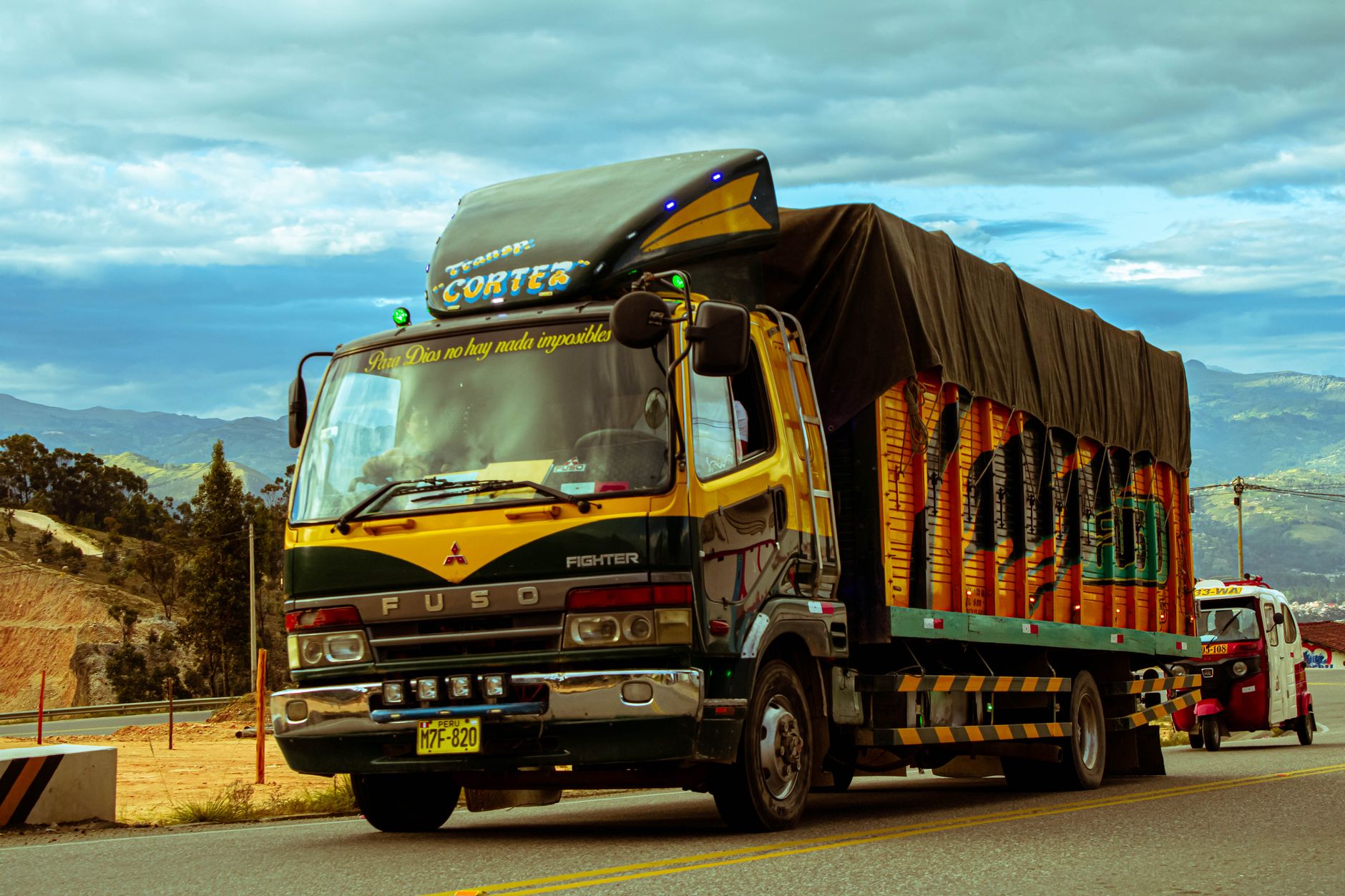 A freight delivery truck on a highway representing rising trucking costs