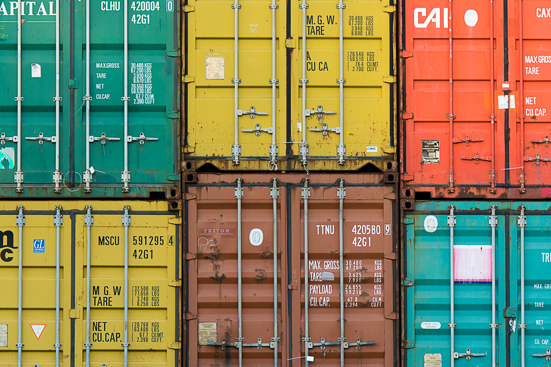 Large cargo containers stacked at a shipping port