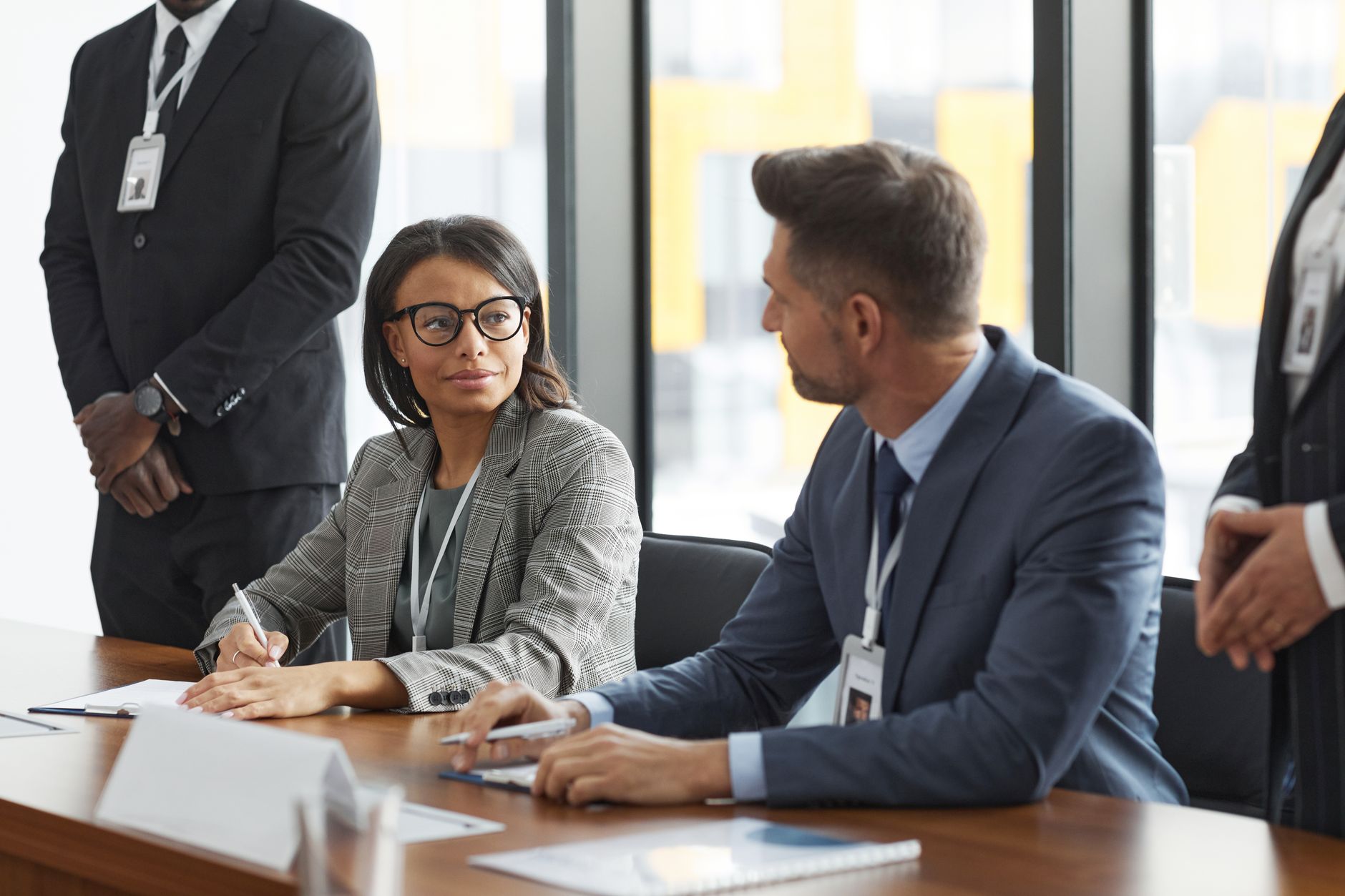 Business professionals in a modern corporate meeting room