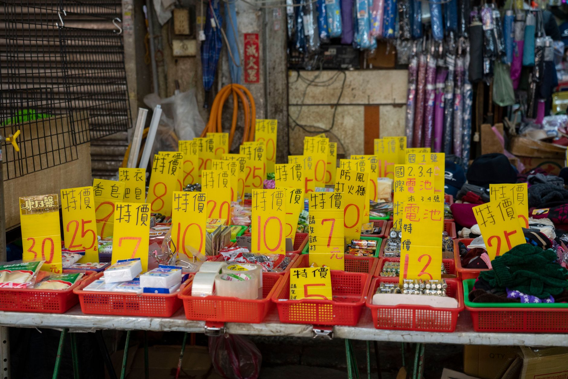 Assorted secondhand goods arranged for resale at a local market