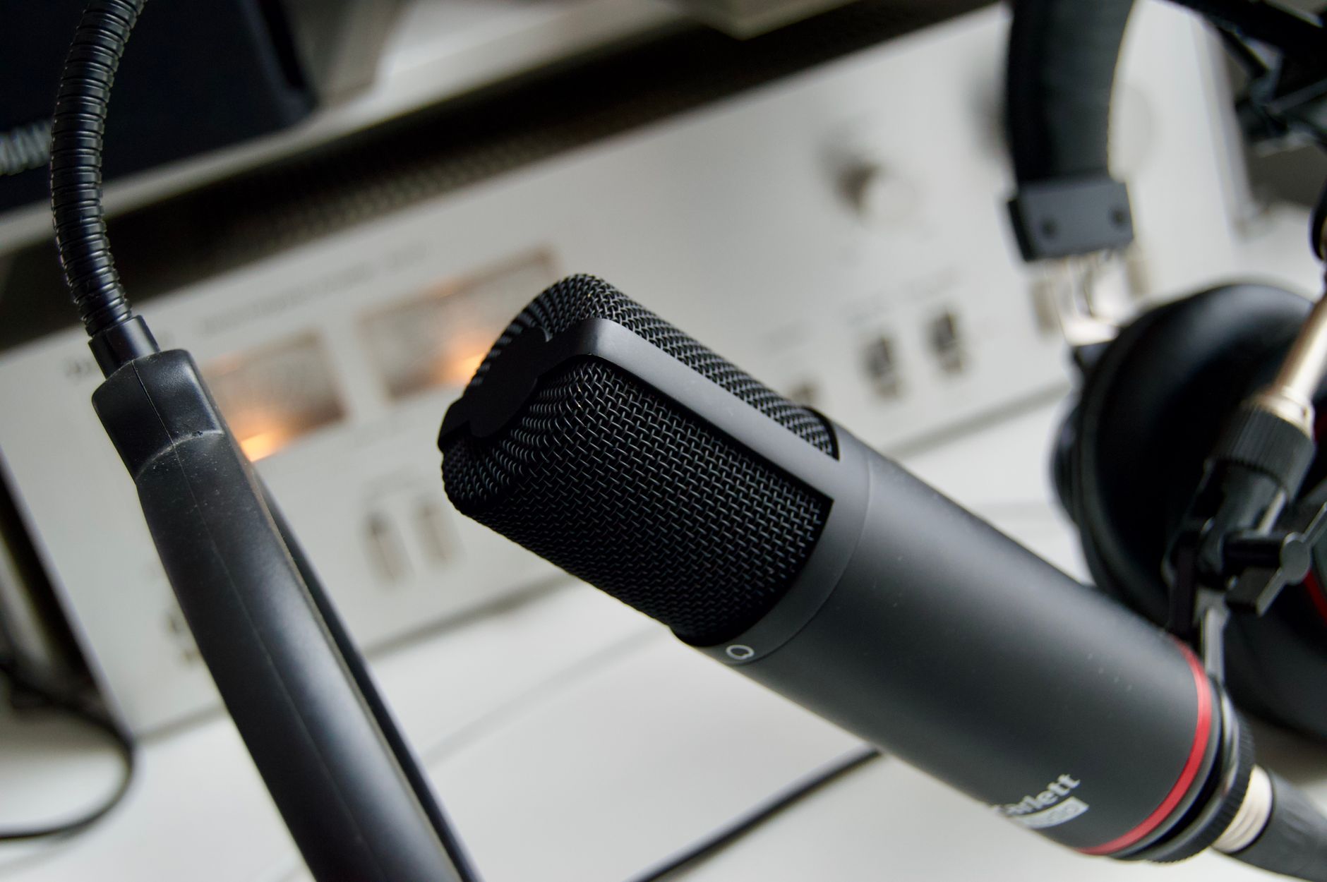 Podcast microphone setup in a studio, representing the Allure Perspectives podcast recording