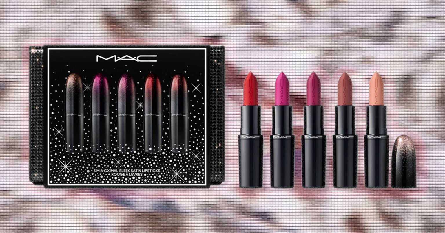 Ulta Beauty Holiday Gift Sets Worth Checking Out This Season Assorted holiday beauty gift sets arranged on a festive background